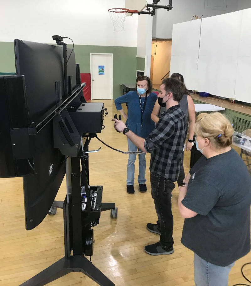 Mobile video conferencing cart in gym